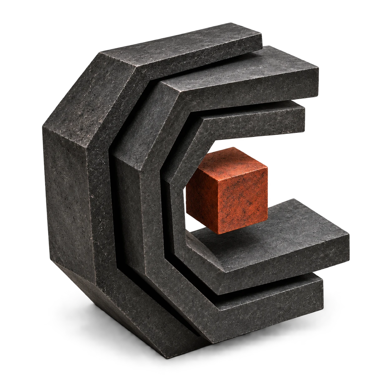 A graphite C sculpture surrounding a rust-colored core